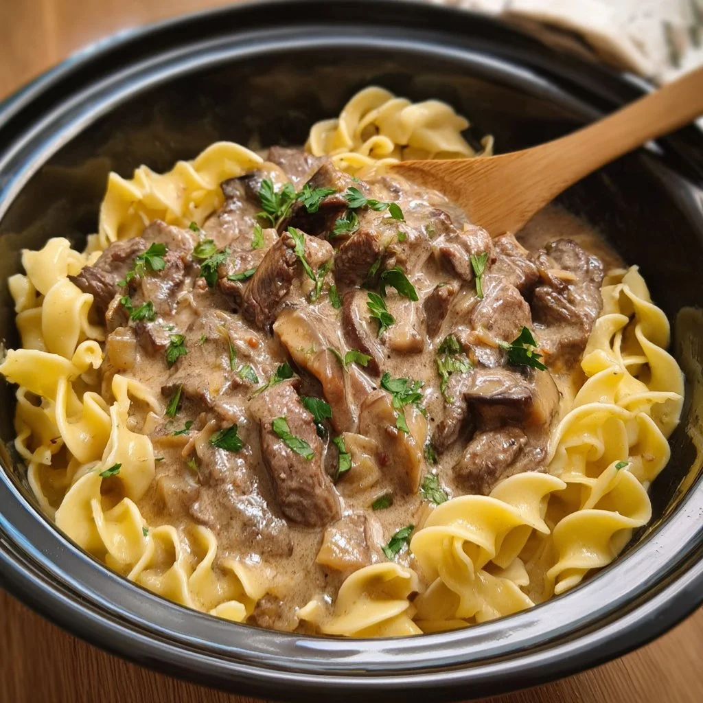 Cozy and creamy beef stroganoff with egg noodles in a bowl